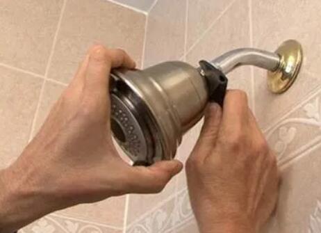 change shower head to increase water pressure