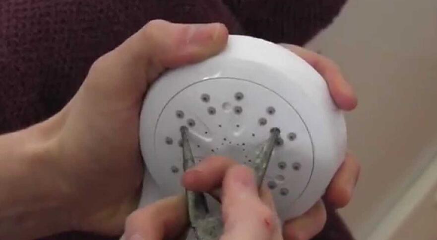 deep cleaning your shower head