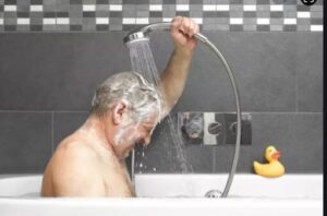 elderly use handheld shower head